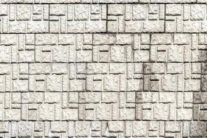Texture of a decorative brick-like tiles. Abstract background for design. photo