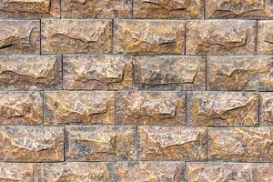 Texture of a decorative brick-like tiles. Abstract background for design. photo