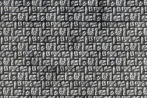 Texture of a decorative brick-like tiles. Abstract background for design. photo