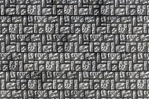 Texture of a decorative brick-like tiles. Abstract background for design. photo