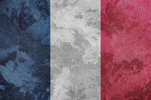 Flag of the France on a grunge texture. photo
