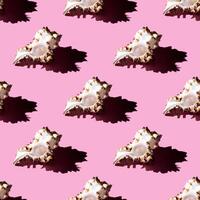 Seamless pattern of clam shells on a pastel background. photo