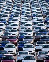 Volkswagen Group Rus, Russia, Kaluga - MAY 25, 2020 Rows of a new cars parked in a distribution center on a sunny day in the spring photo