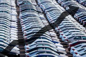 The concept of growth in the production of cars or prices for them. Growth in sales, demand and purchases of a cars. photo