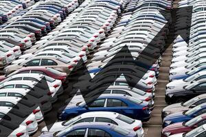 The concept of growth in the production of cars or prices for them. Growth in sales, demand and purchases of a cars. photo