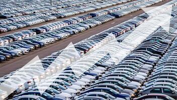 The concept of growth in the production of cars or prices for them. Growth in sales, demand and purchases of a cars. photo