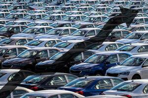 The concept of growth in the production of cars or prices for them. Growth in sales, demand and purchases of a cars. photo