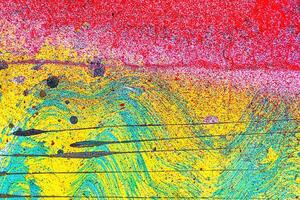 Colorful graffiti painted on a wall. Abstract urban background. photo
