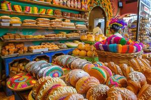 Traditional Mexican bakery delights. Colorful display of festive pastries and breads photo