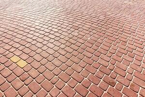 Texture of a paving stone road. Abstract background for design. photo