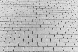 Texture of a paving stone road. Abstract background for design. photo