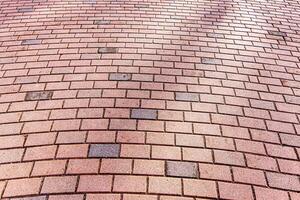 Texture of a paving stone road. Abstract background for design. photo