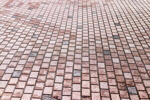 Texture of a paving stone road. Abstract background for design. photo
