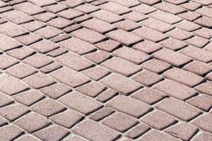 Texture of a paving stone road. Abstract background for design. photo