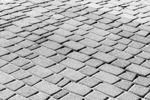 Texture of a paving stone road. Abstract background for design. photo