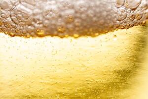 Texture of gas bubbles in light beer. photo