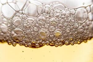 Texture of gas bubbles in light beer. photo