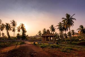 Sunset or sunrise in Hampi, Karnataka state, India. Ruins of ancient Hindu temples and buildings. photo