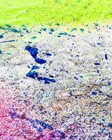 Fragment of colored graffiti painted on a wall. Bright abstract background for design. Spray pictures. photo