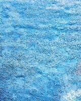 Fragment of colored graffiti painted on a wall. Bright abstract background for design. Spray pictures. photo