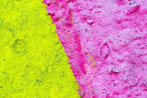 Fragment of colored graffiti painted on a wall. Bright abstract background for design. Spray pictures. photo