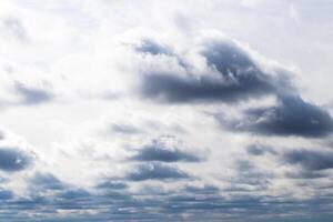 Cumulus clouds in the sky in cloudy weather. Abstract background. photo