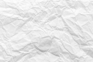 Texture of crumpled white parchment or paper. Abstract background for design. Blank with copy space. photo