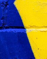 Fragment of colored graffiti painted on a wall. photo