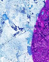 Fragment of colored graffiti painted on a wall. photo