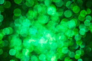 Green lights abstract bokeh backdrop. Chrismas lights bokeh. photo