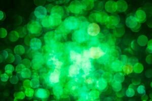 Green lights abstract bokeh backdrop. Chrismas lights bokeh. photo