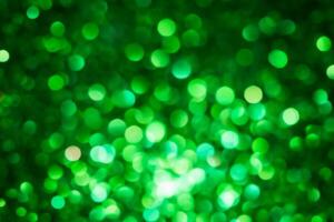 Green lights abstract bokeh backdrop. Chrismas lights bokeh. photo