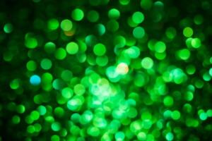 Green lights abstract bokeh backdrop. Chrismas lights bokeh. photo