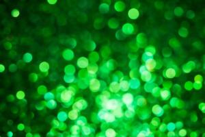 Green lights abstract bokeh backdrop. Chrismas lights bokeh. photo