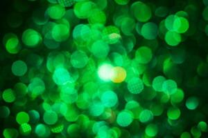 Green lights abstract bokeh backdrop. Chrismas lights bokeh. photo