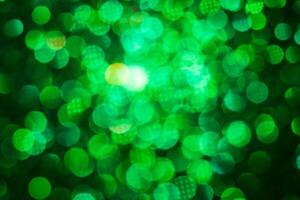 Green lights abstract bokeh backdrop. Chrismas lights bokeh. photo