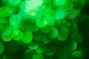 Green lights abstract bokeh backdrop. Chrismas lights bokeh. photo