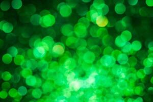 Green lights abstract bokeh backdrop. Chrismas lights bokeh. photo