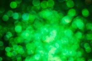 Green lights abstract bokeh backdrop. Chrismas lights bokeh. photo
