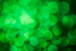 Green lights abstract bokeh backdrop. Chrismas lights bokeh. photo