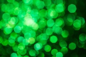 Green lights abstract bokeh backdrop. Chrismas lights bokeh. photo