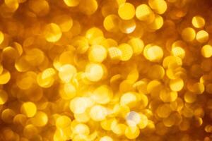 Golden lights abstract bokeh backdrop. Chrismas lights bokeh. photo