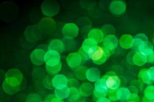 Green lights abstract bokeh backdrop. Chrismas lights bokeh. photo