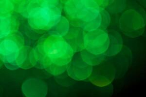 Green lights abstract bokeh backdrop. Chrismas lights bokeh. photo