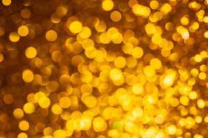 Golden lights abstract bokeh backdrop. Chrismas lights bokeh. photo