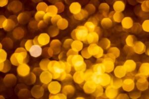 Golden lights abstract bokeh backdrop. Chrismas lights bokeh. photo