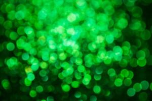 Green lights abstract bokeh backdrop. Chrismas lights bokeh. photo