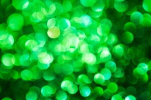Green lights abstract bokeh backdrop. Chrismas lights bokeh. photo