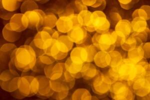 Golden lights abstract bokeh backdrop. Chrismas lights bokeh. photo