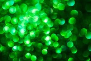 Green lights abstract bokeh backdrop. Chrismas lights bokeh. photo